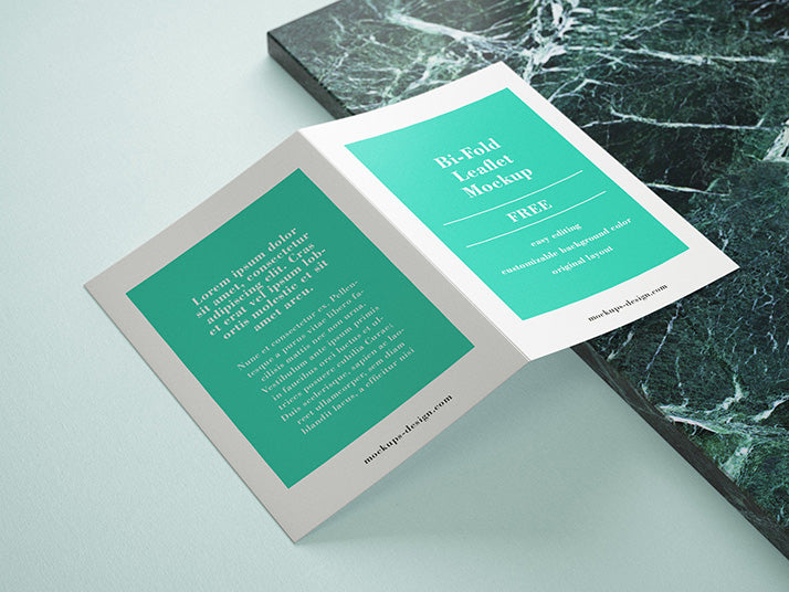 Free Creative Mockup of Bi-Fold Leaflet Brochure with Marble Rock Panel