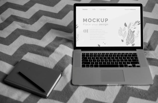 Free Agenda Beside Laptop Psd