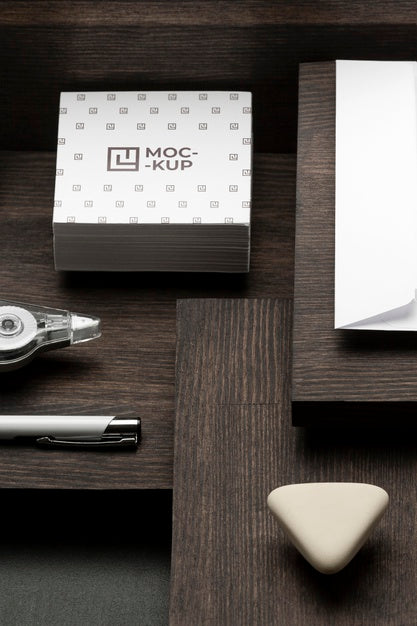 Free Arrangement Of Mock-Up Stationery On Wood Psd
