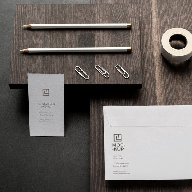 Free Arrangement Of Mock-Up Stationery On Wood Psd