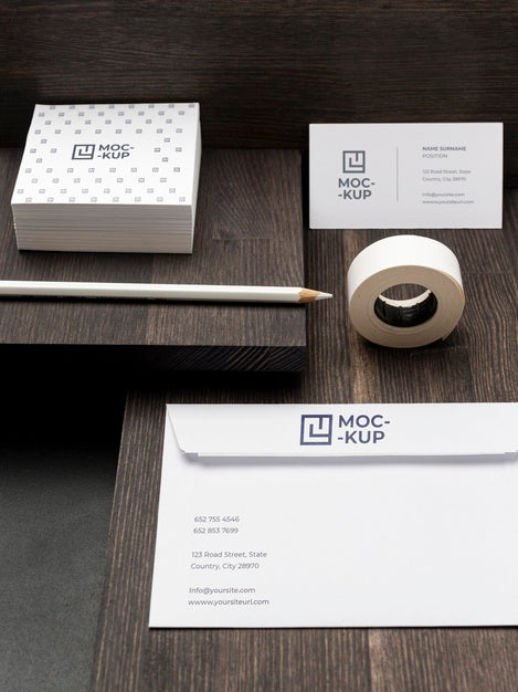 Free Arrangement Of Mock-Up Stationery On Wood Psd