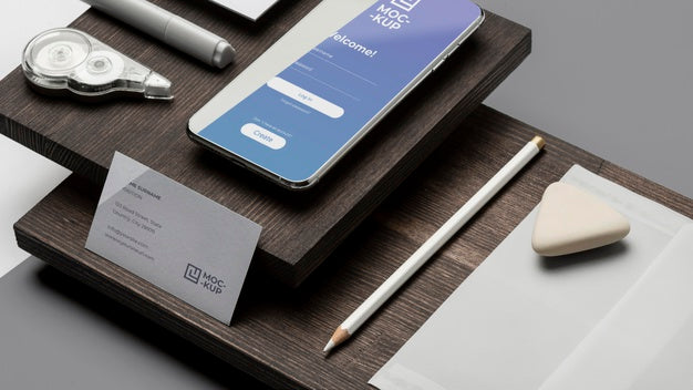 Free Arrangement Of Mock-Up Stationery On Wood Psd