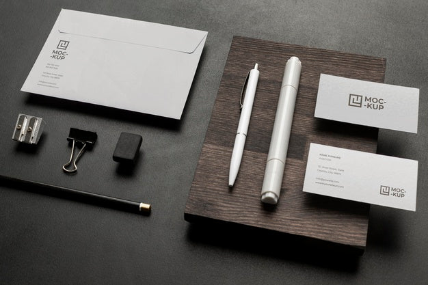 Free Arrangement Of Mock-Up Stationery On Wood Psd