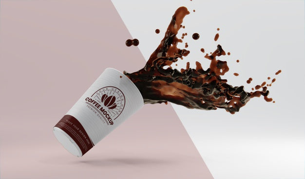 Free Arrangement Of Paper Coffee Cup With Coffee Splash Psd
