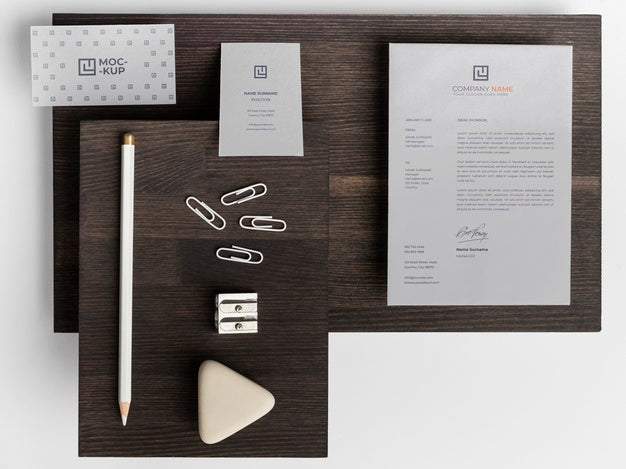 Free Assortment Of Mock-Up Stationery On Wood Psd