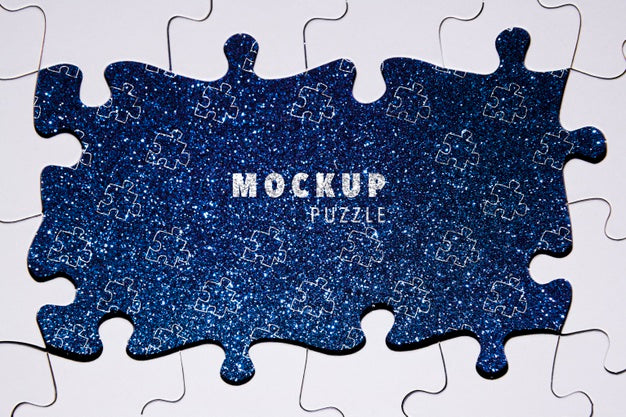 Free Assortment With Puzzle Pieces On Glitter Background Psd