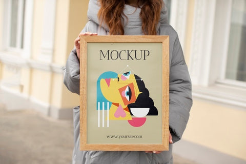 Free Beautiful Frame Model Mockup Held By Girl Psd