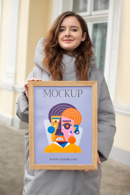 Free Beautiful Frame Model Mockup Held By Girl Psd