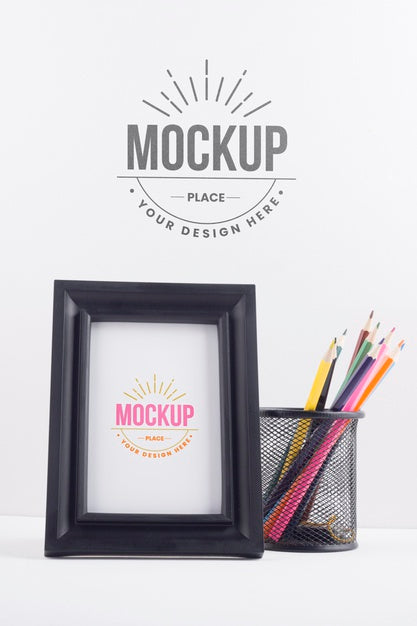 Free Black Frame Mock-Up Next To Stationery Elements Psd