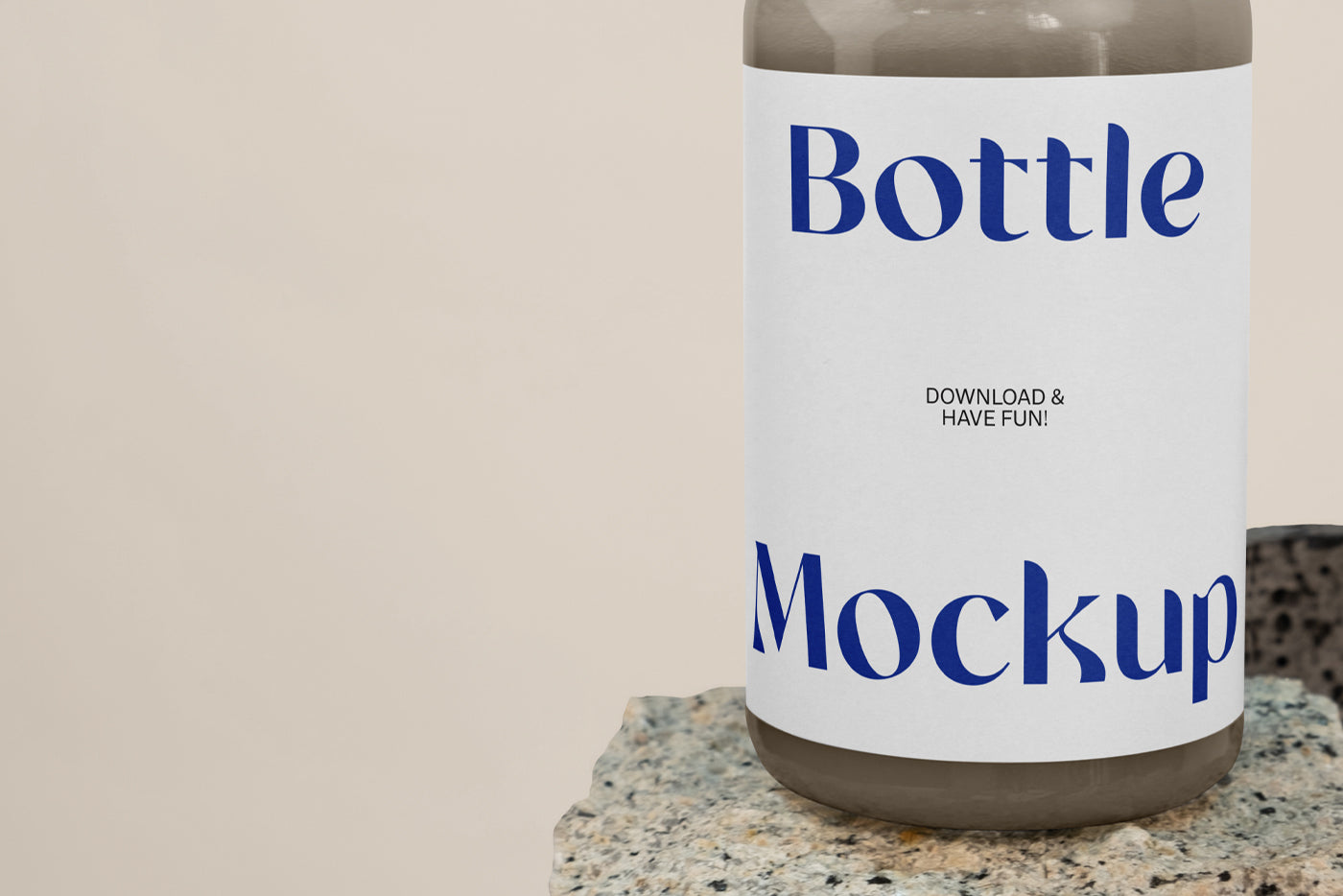 Free Bottle On Stone Mockup