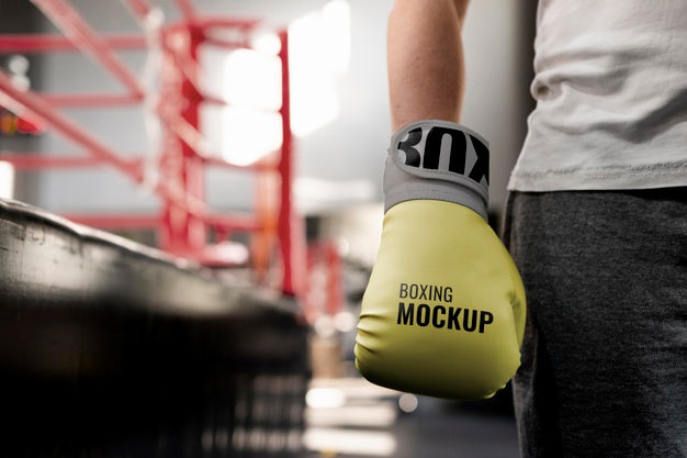 Free Boxing Athlete Wearing Mock-Up Gloves To Train Psd