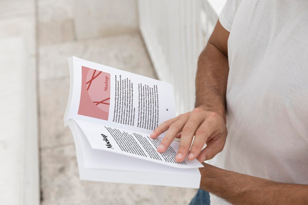 Free Close Up Man On Street Reading Book Psd