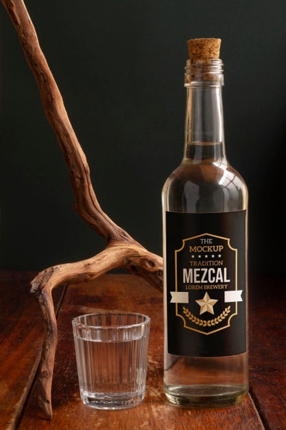 Free Close Up On Mezcal Drink Bottle With Glasses Psd
