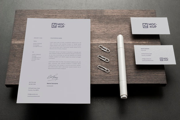 Free Composition Of Mock-Up Stationery On Wood Psd