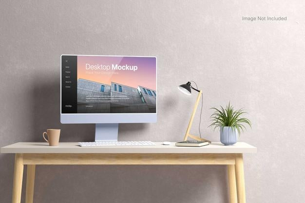 Free Computer Desktop Screen On A Table Mockup Psd