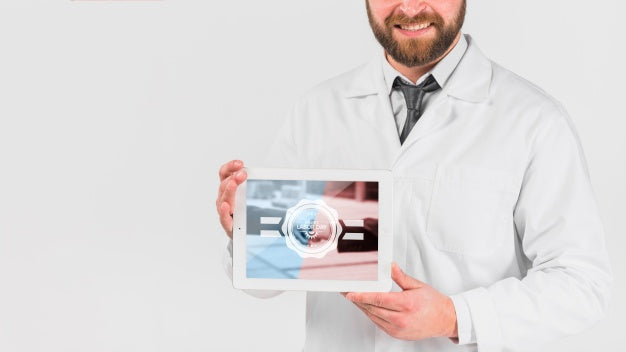 Free Doctor Holding Tablet Mockup For Labor Day Psd