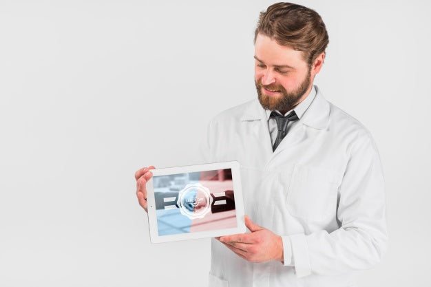 Free Doctor Holding Tablet Mockup For Labor Day Psd