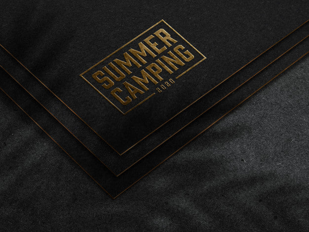 Free Embossed Gold Logo Mockup On Dark Paper Psd