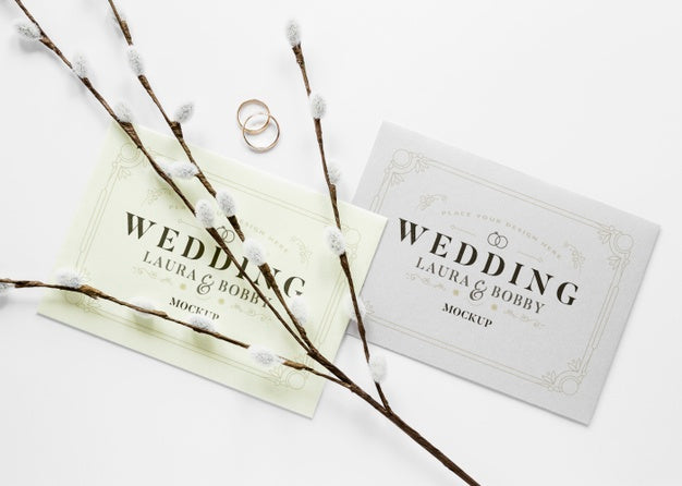 Free Fat Lay Of Wedding Cards With Rings And Flowers Psd