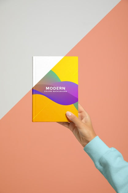Free Front View Of Book Held By Hand Psd