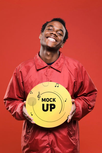 Free Front View Of Happy Man Holding Vinyl Disk For Music Store Mock-Up Psd