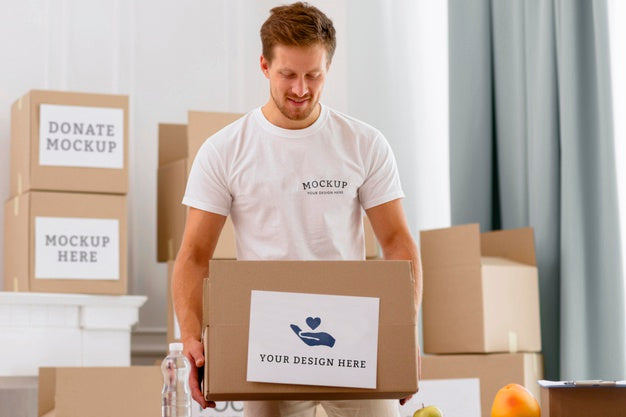 Free Front View Of Male Volunteer Holding Donation Box Psd