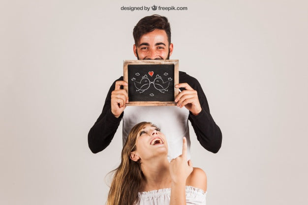 Free Funny Couple Showing Slate Psd