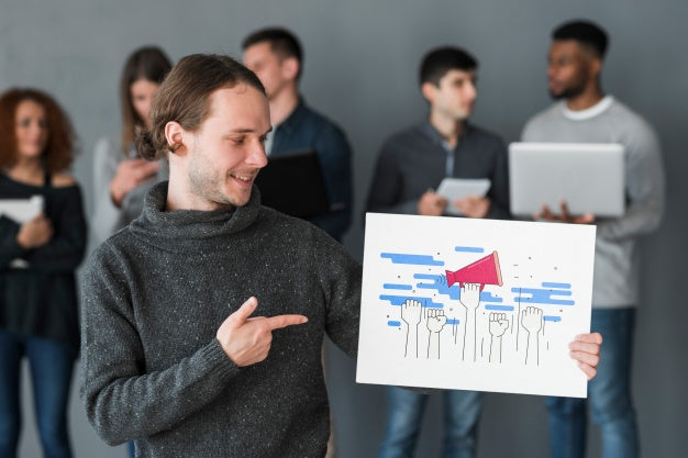 Free Group Of People Holding Placard Mockup For Charity Psd