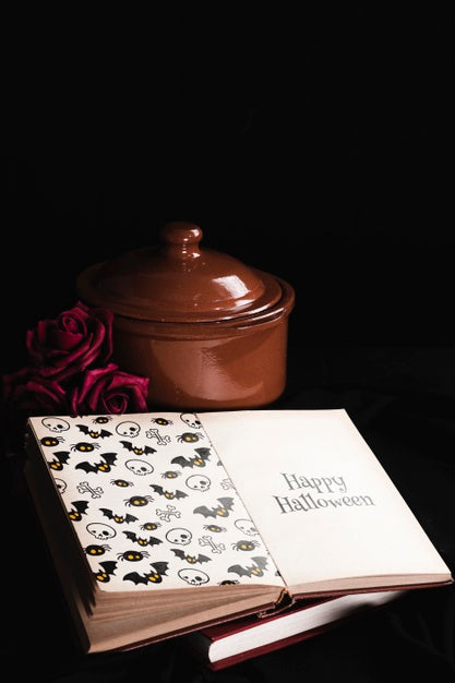 Free Halloween Concept With Mock-Up Book And Black Background Psd