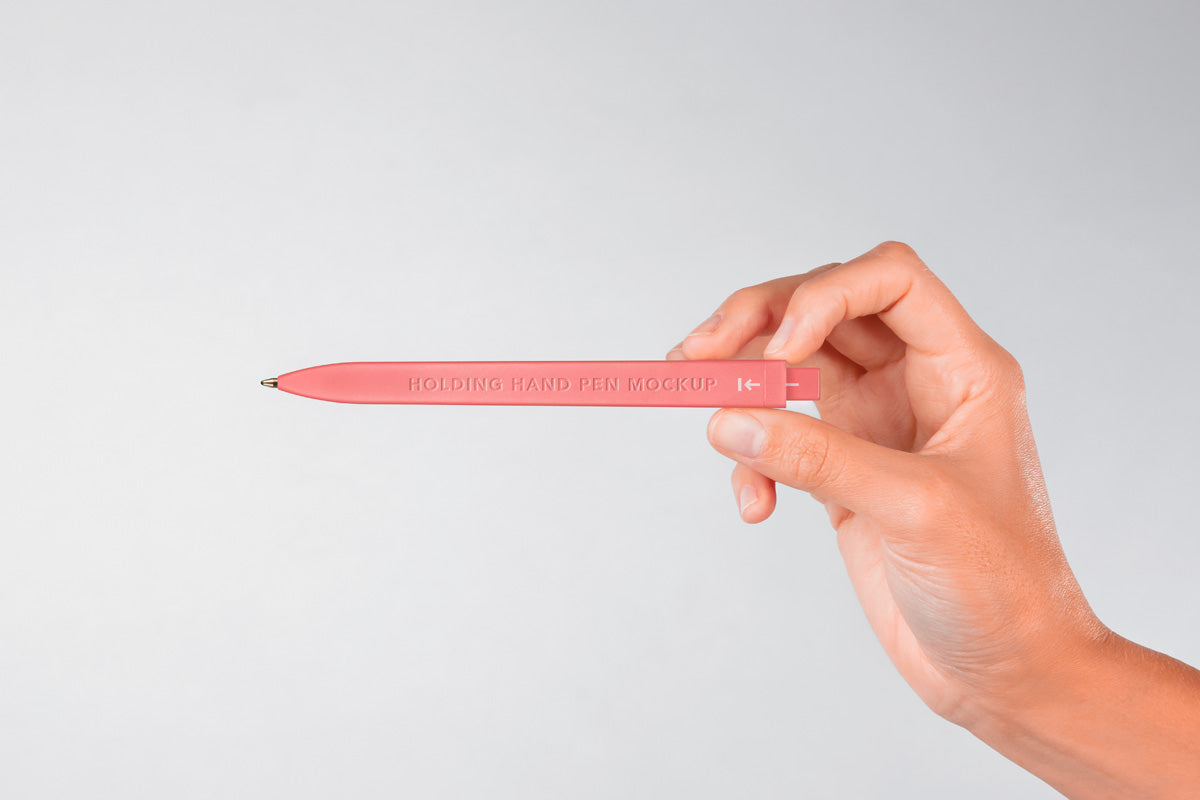Free Hand Holding Branding Psd Pen Mockup