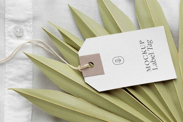 Free High Angle Of Clothing Label Mock-Up On White Shirt Textile Psd