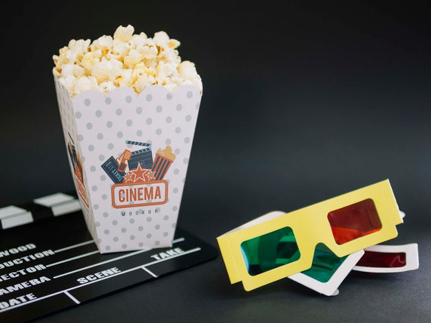 Free High Angle Of Cup With Popcorn And Cinema Glasses Psd