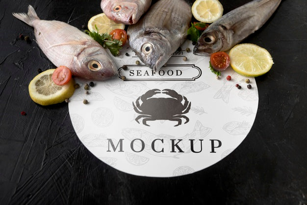 Free High Angle Of Fish With Lemon And Tomatoes Psd