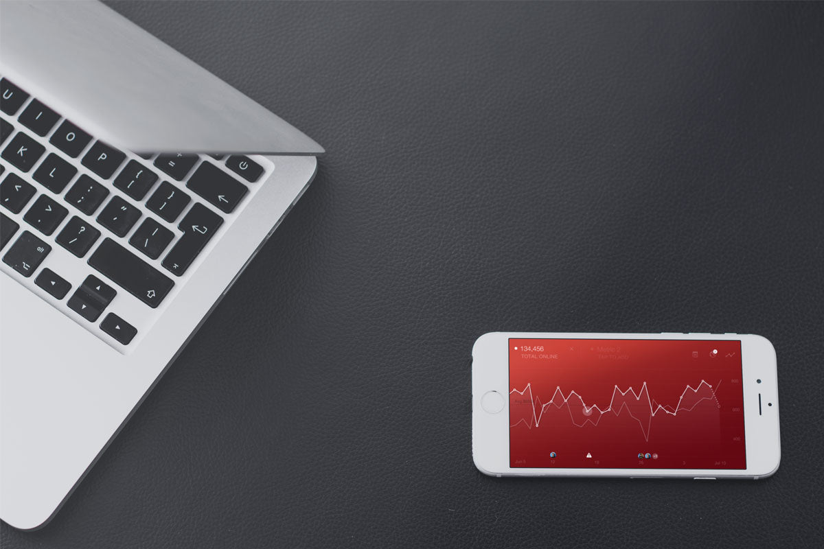 Free iPhone Mockup And Macbook On A Leather Background