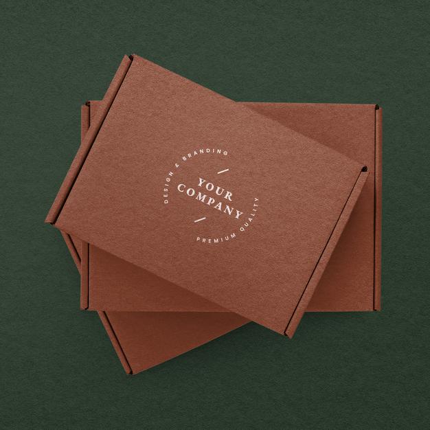 Free Kraft Box Packaging Mockup In Red Advertisement Psd