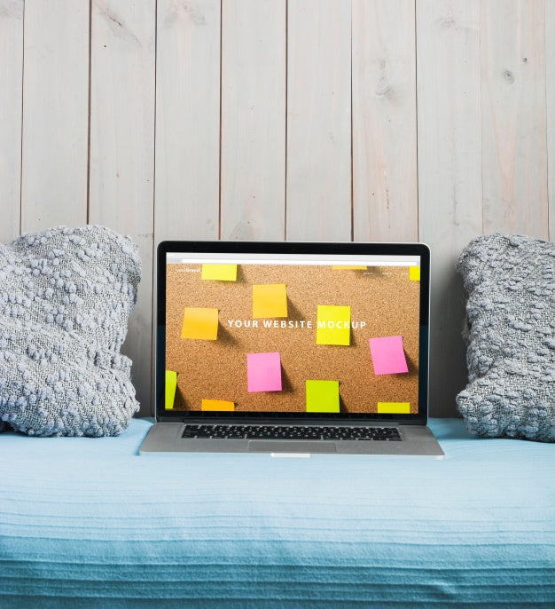 Free Laptop Mockup On Bed Psd