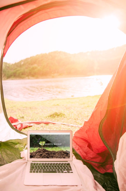 Free Laptop Mockup With Camping In Nature Concept Psd