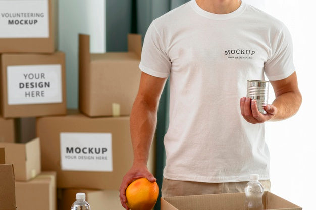 Free Male Volunteer Holding Provisions For Donation Psd