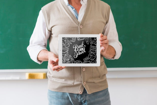 Free Man Holding Back To School Frame Mock-Up Psd