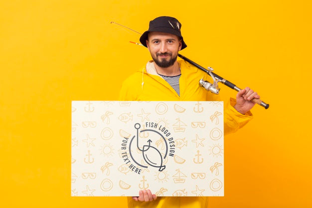 Free Man Holding Rod And Mock-Up Horizontal Card Psd