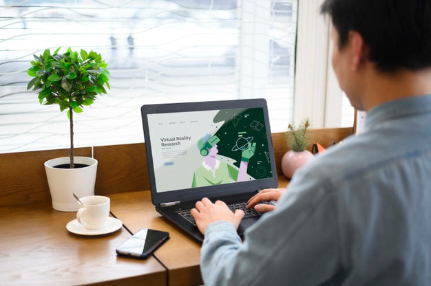 Free Man Typing On Laptop Keyboard Psd