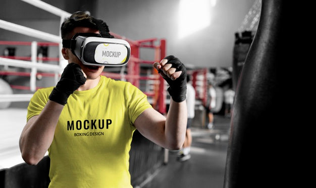 Free Man Using Virtual Reality Goggles At Boxing Training Psd