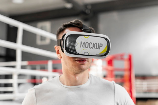 Free Man Using Virtual Reality Goggles At Boxing Training Psd