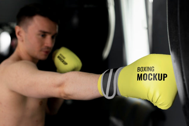Free Man Wearing Boxing Gloves Mock-Up Psd