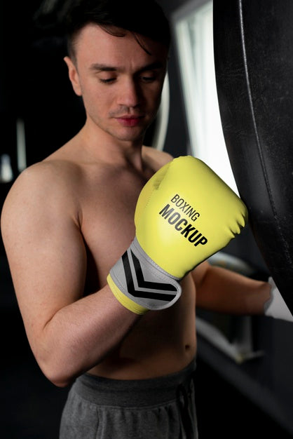 Free Man Wearing Boxing Gloves Mock-Up Psd
