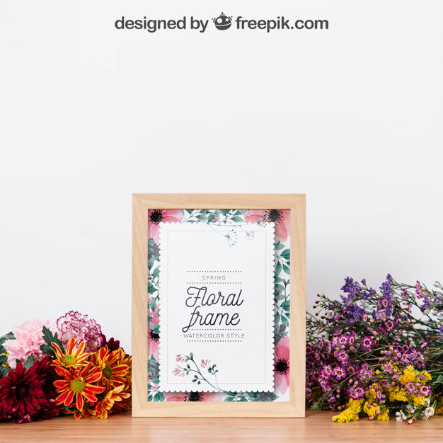 Free Wooden Frame Mockup Between Beautiful Flowers
