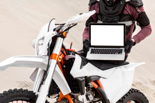 Free Motorcyclist Holding Laptop Psd