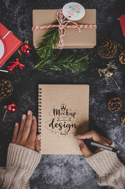 Free Notebook Mockup With Christmas Decoration Psd