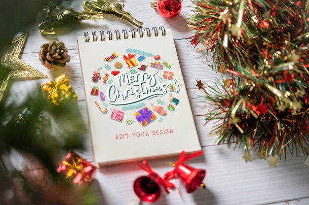 Free Notebook Mockup With Christmas Decoration Psd