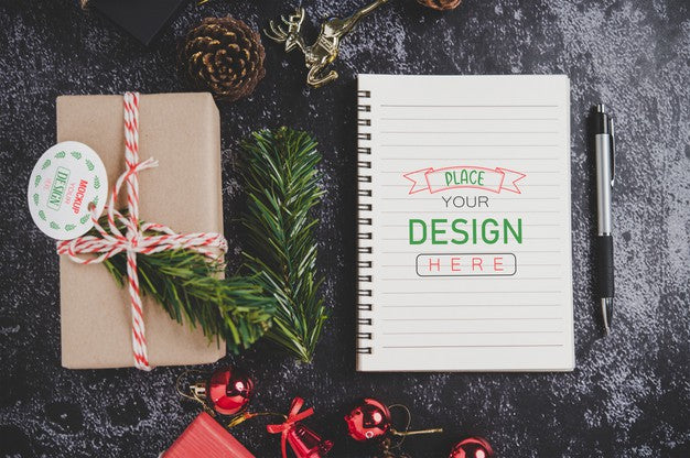 Free Notebook Mockup With Christmas Decoration Psd